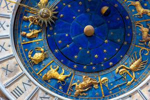 Astrological signs on ancient clock Torre dell’Orologio, Venice, Italy. Medieval Zodiac wheel and constellations. Golden symbols on star circle. Concept of astrology, horoscope and time. Astrological signs on ancient clock Torre dell’Orologio, Venice, Italy. Medieval Zodiac wheel and constellations. Golden symbols on star circle. Concept of astrology, horoscope and time.