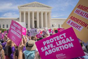 Pro-abortion protesters rally outside the Supreme Court. Pro-abortion protesters rally outside the Supreme Court.