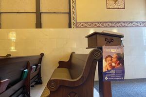 A Catholic church displays signs urging congregants to "vote yes" on the "Value them both" amendment. A Catholic church displays signs urging congregants to "vote yes" on the "Value them both" amendment.