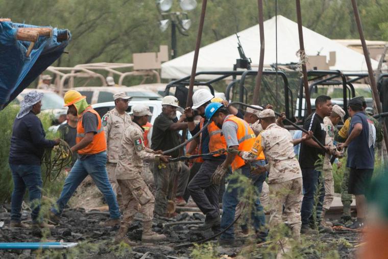 Mexican soldiers and rescue personnel work at the coal mine where 10 miners were trapped Wednesday after a collapse, in the Agujita community, Sabinas municipality, Coahuila state, Mexico, on August 5, 2022. Mexican soldiers and rescue personnel work at the coal mine where 10 miners were trapped Wednesday after a collapse, in the Agujita community, Sabinas municipality, Coahuila state, Mexico, on August 5, 2022.