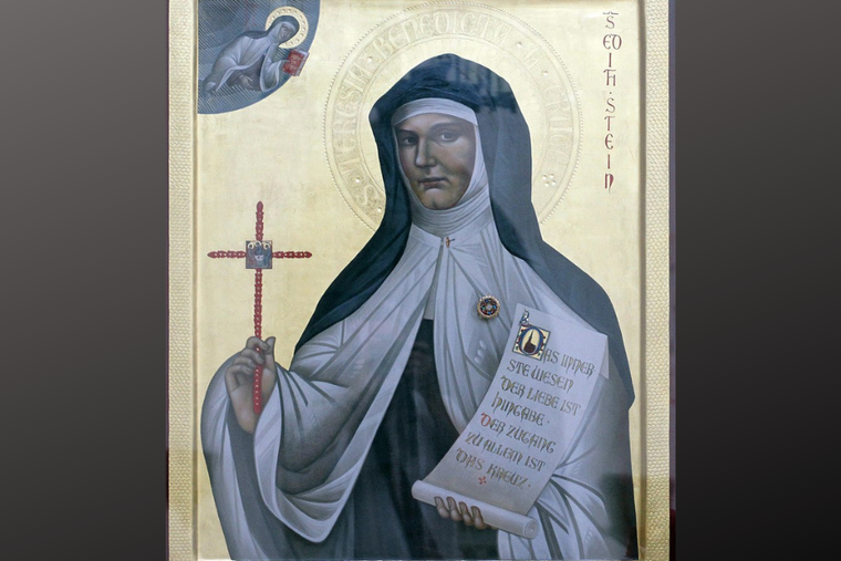 St. Teresa of Benedicta is shown on an icon in Bad Bergzabern, Germany. The scroll shows a quote from her works: ‘The innermost essence of love is self-offering. The entryway to all things is the Cross.’ St. Teresa of Benedicta is shown on an icon in Bad Bergzabern, Germany. The scroll shows a quote from her works: ‘The innermost essence of love is self-offering. The entryway to all things is the Cross.’