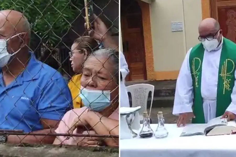 The faithful gather for Mass behind the fence of the church as the parochial vicar celebrates Mass in the atrium of Santa Lucía parish in Matagalpa, Nicaragua, Aug. 16. The faithful gather for Mass behind the fence of the church as the parochial vicar celebrates Mass in the atrium of Santa Lucía parish in Matagalpa, Nicaragua, Aug. 16.