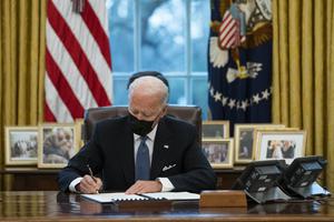 President Joe Biden signs an executive order reversing the Trump-era restriction on transgender individuals serving in military, Jan. 25, in Washington. Five days earlier, he signed an executive order that directed federal agencies to enforce laws to prohibit discrimination based on sexual orientation and gender identity in areas including (but not limited to) employment, housing, health care, education and credit. President Joe Biden signs an executive order reversing the Trump-era restriction on transgender individuals serving in military, Jan. 25, in Washington. Five days earlier, he signed an executive order that directed federal agencies to enforce laws to prohibit discrimination based on sexual orientation and gender identity in areas including (but not limited to) employment, housing, health care, education and credit.