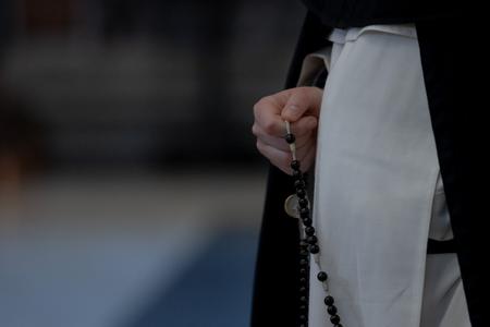 A religious holds a rosary at the Eucharistic adoration for life prayer vigil in Rome on May 21, 2021. A religious holds a rosary at the Eucharistic adoration for life prayer vigil in Rome on May 21, 2021.
