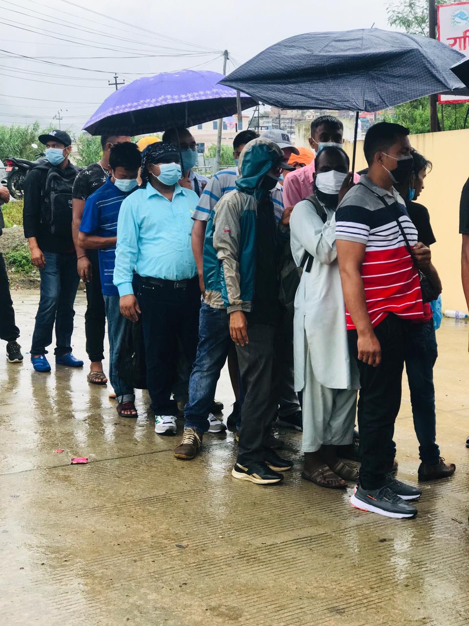 Nepali workers queue up for QR codes