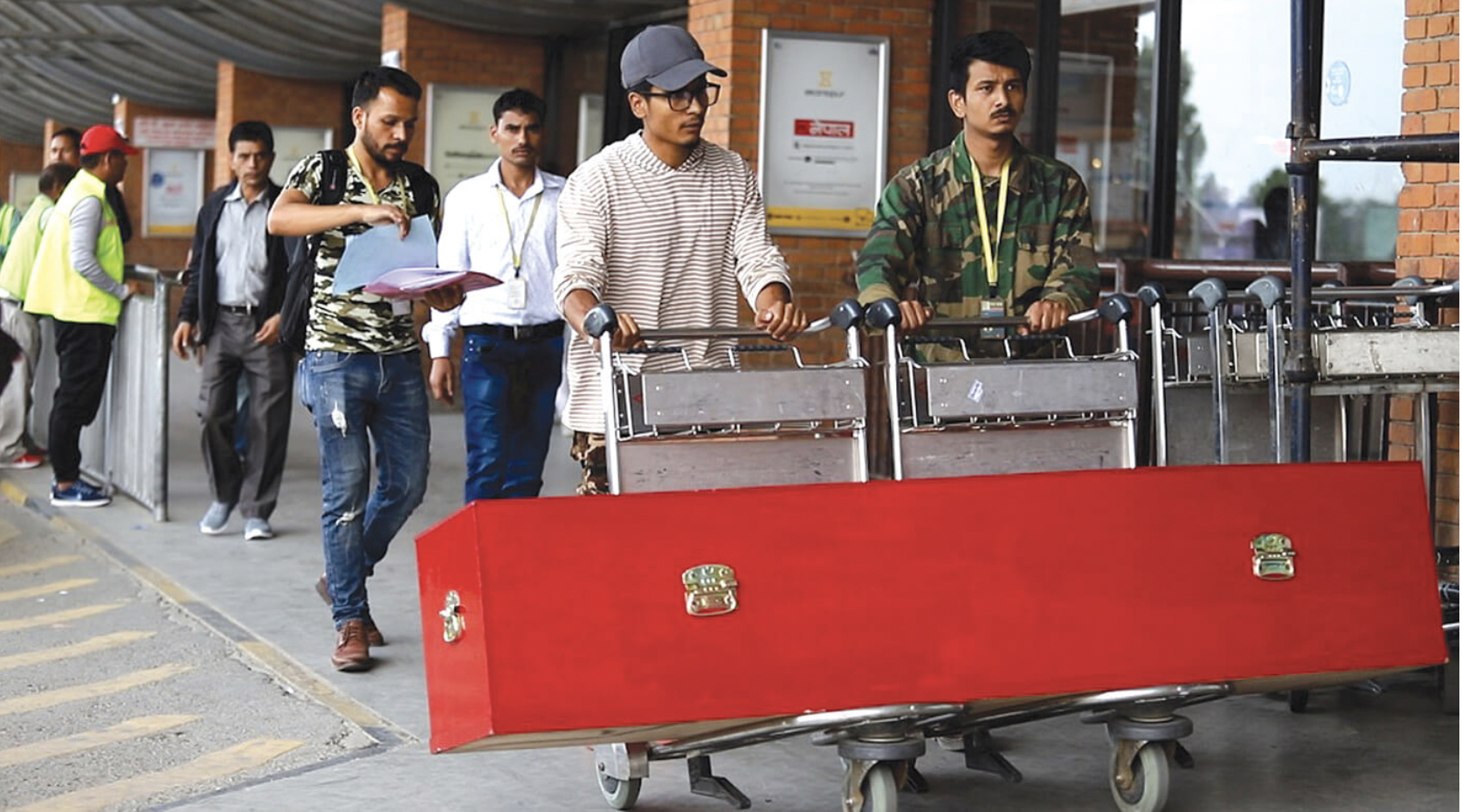 Qatar urged to pay families of dead workers