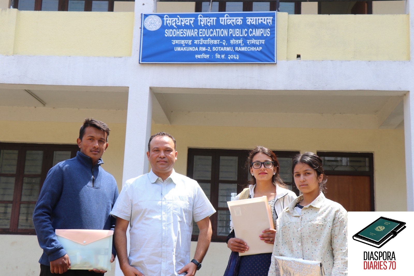 HELPING HANDS: Buddha Baraili with the three students he now supports financially to purse their undergrad education, like he himself was sponsored by a German couple.