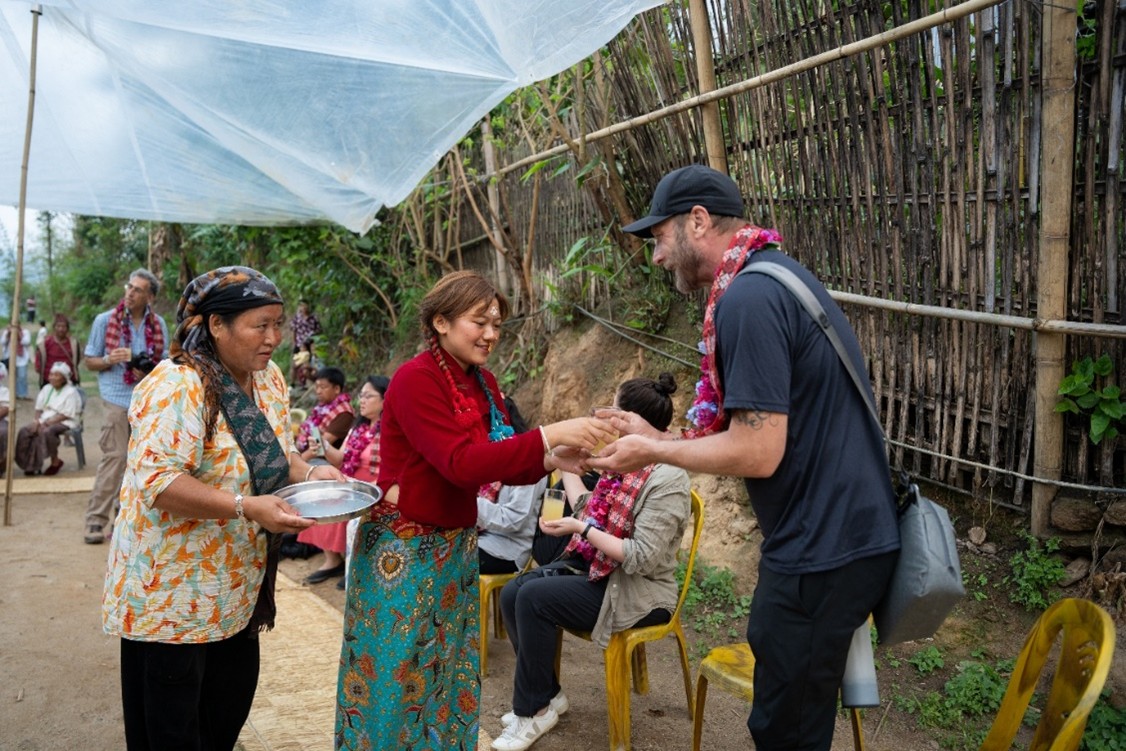 The Aathpahariya community welcoming guests.