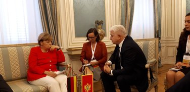 Angela Merkel, Duško Marković
