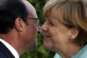 Fransoa Oland, Angela Merkel