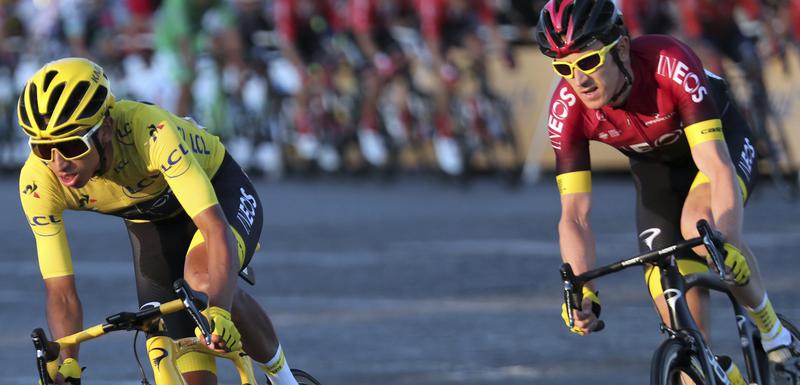 Colombia's Egan Bernal wearing the overall leader's yellow jersey, rides with Britain's Geraint Thomas on the Champs-Elysees during the twenty-first stage of the Tour de France cycling race over 128 kilometers (79.53miles) with start in Rambouillet and finish in Paris, France, Sunday, July 28, 2019. (AP Photo/Thibault Camus)