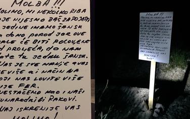 Tabla postavljena kraj rijeke