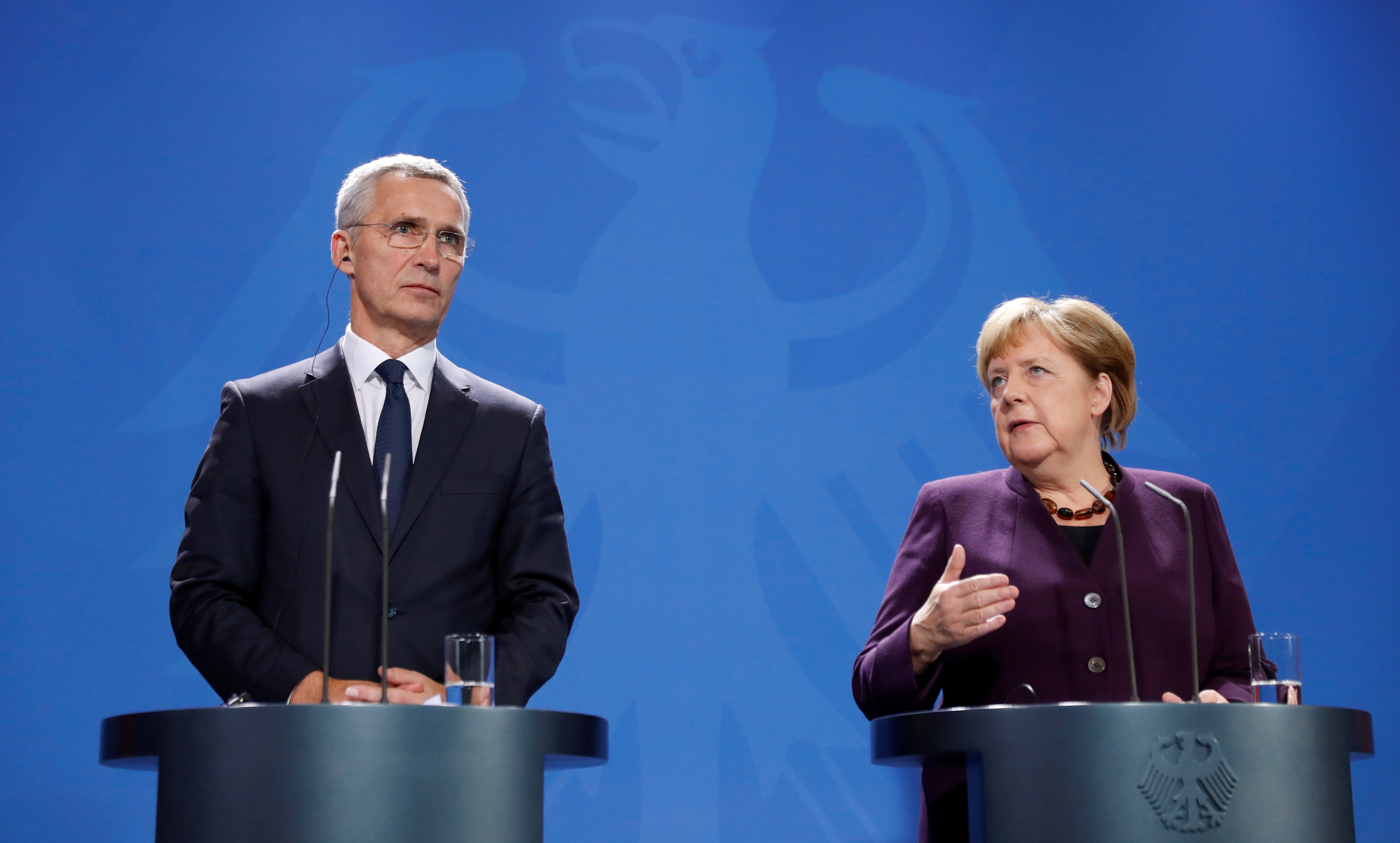 Jens Stoltenberg i Angela Merkel