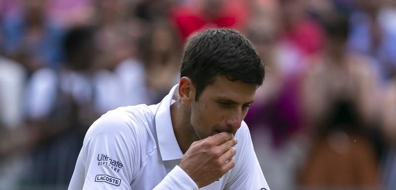 Novak Đoković nakon pobjede nad Federerom prošle godine u finalu Vimbldona